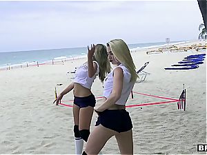 three teen beauties catch a large dong on the beach