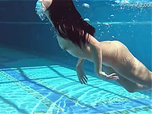Jessica Lincoln smallish tattooed Russian nubile in the pool