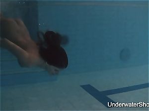 softcore underwater display of Natalia